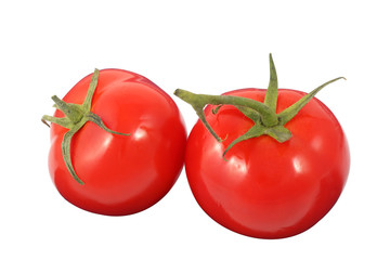 Two fresh ripe red tomato in a row isolated on a white