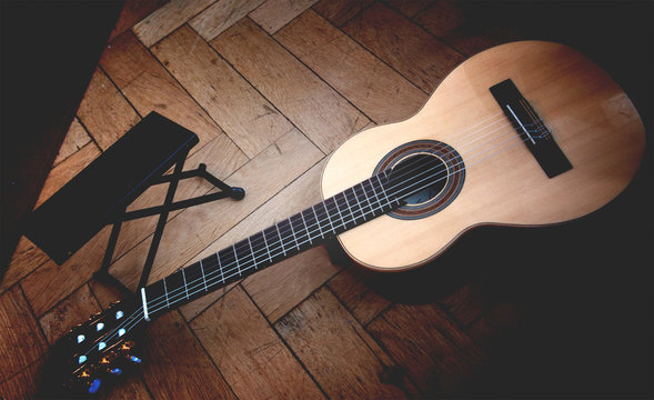 Guitar on Wood Floor
