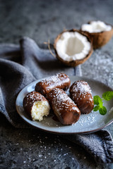 Coconut bars coated in chocolate