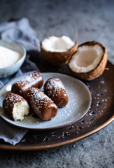 Coconut bars coated in chocolate