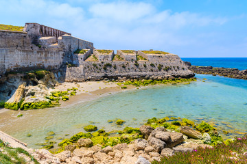 Small bay with beach on Isla de las Palomas in Tarifa town, Costa de la Luz, Spain