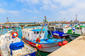 Colorful fishing boats anchoring in the Andalusian town of Tarifa, Costa de la Luz, Spain