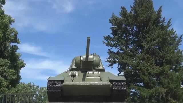 T34 tank, blue sky and some trees behind it, Berlin, Germany 