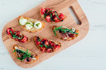 Italian bruschetta on cutting board