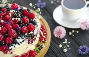 Cheese cake on wooden table.