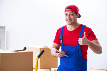 Contractor worker moving boxes during office move
