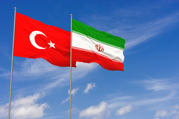 Turkey and Iran flags over blue sky background. 3D illustration