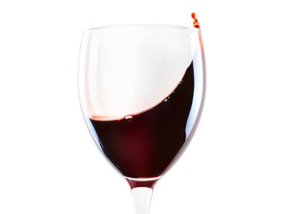 Red wine glass with splash isolated