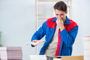 Worker in publishing house preparing book order