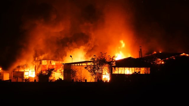Huge Fire At An Industrial Facility During Nighttime Slow Motion 4K 1