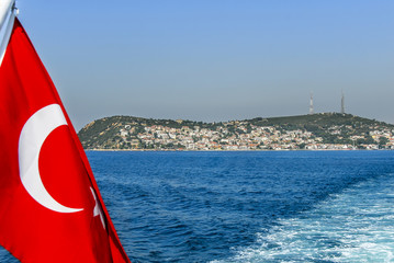 Istanbul, Turkey, 20 July 2011: Kinali Island with Turkish Flag, Princes Islands district of Istanbul