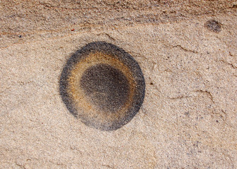 Fototapeta na wymiar Wierd sandstone abstract circles n in the Da Na Zin wilderness of Northern New Mexico