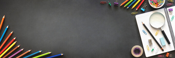 Back to School Concept with Stationery Supplies and Blackboard