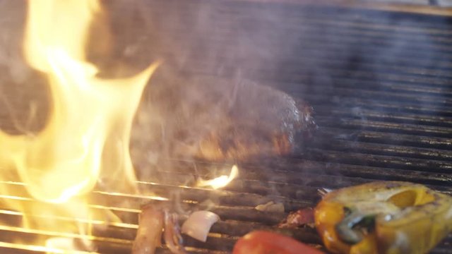 Cheff preparing meat meal in kitchen. 