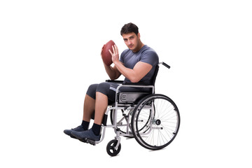 Obraz premium Football player recovering from injury on wheelchair