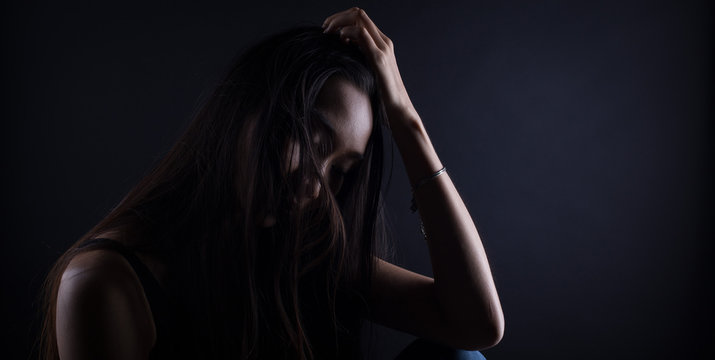 broken heart lonely girl can cry, smoke Fog on dark Background