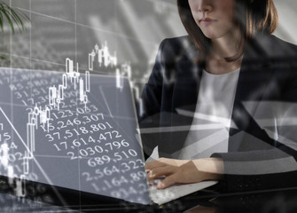 ビジネスイメージ　グラフと若い女性