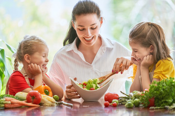Happy family in the kitchen.