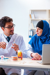 Dentist doctor and assistant working on new tooth implant