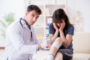 Fototapeta premium Patient visiting doctor after sustaining sports injury