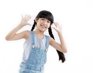 Obraz na płótnie Canvas Portrait of Happy Asian child girl smiling isolated on white background