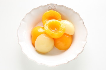 Canned food, yellow and white peach 