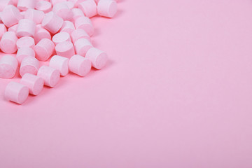 Pink Candy Lollies on a Pink Background