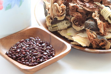 red bean on wooden plate for healthy Chinese medicine herbal life
