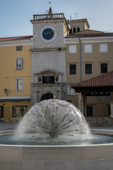 Fountain in Cres, shape of a sphere in direct sunlight