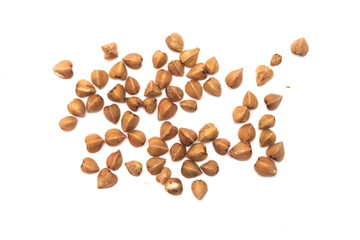 grains of buckwheat on white background