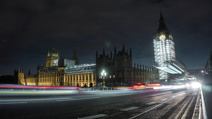 Obraz premium Westminster bridge and Big Ben nighttime long exposure in London