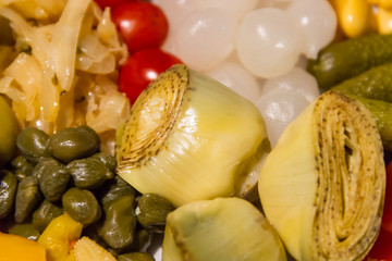 artichoke hearts and other vegetables pickled in vinegar
