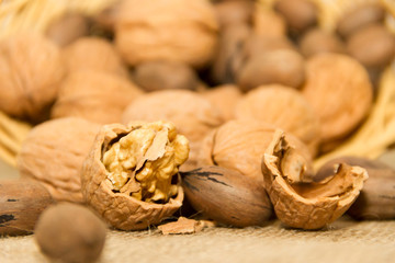 variety of healthy nuts on rustic background