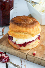 Traditional English scones with strawberry jam and clotted cream