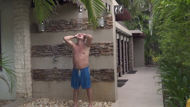 A man washes in the street soul