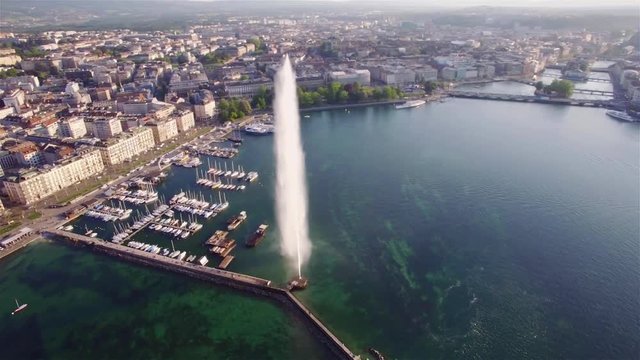 4K ungraded Aerial footage of Geneva city   water fountain in Switzerland - UHD 