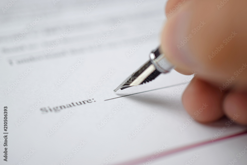 Poster signing a form