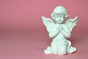 Angel guardian praying