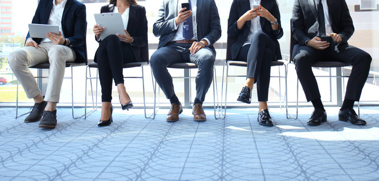 Stressful people waiting for the job interview.