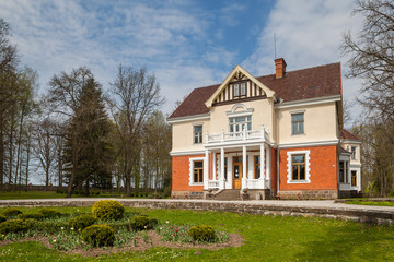 Old Olustvere manor, the remarkable Estonian historical site. Summer time.