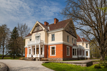 Fototapeta na wymiar Old Olustvere manor, the remarkable Estonian historical site. Summer time.