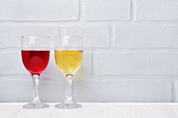Couple glasses with red and white wine for tasting