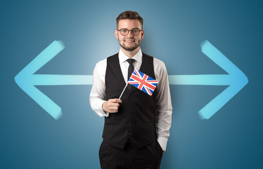 Handsome young boy choosing target country with arrows on the background
