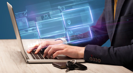 Hand typing on laptop with online accounting system concept
