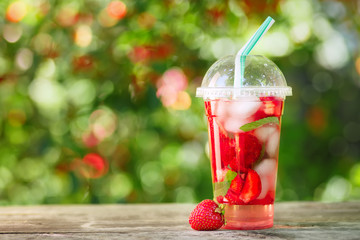strawberry lemonade in plastic glass