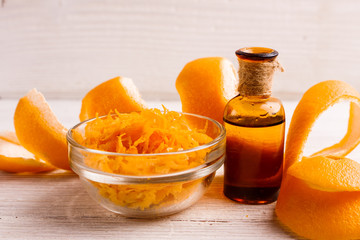orange essential oil on a white background