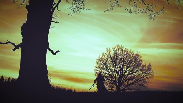At sunset there is a grim Reaper