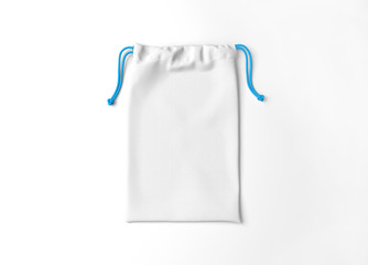 White drawstring bag on white background. Fabric cotton small bag. Isolated pouch.