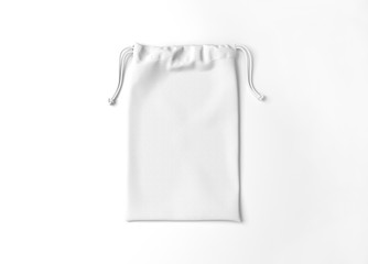 White drawstring bag on white background. Fabric cotton small bag. Isolated pouch.