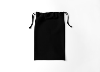 Black drawstring bag on white background. Fabric cotton small bag. Isolated pouch.